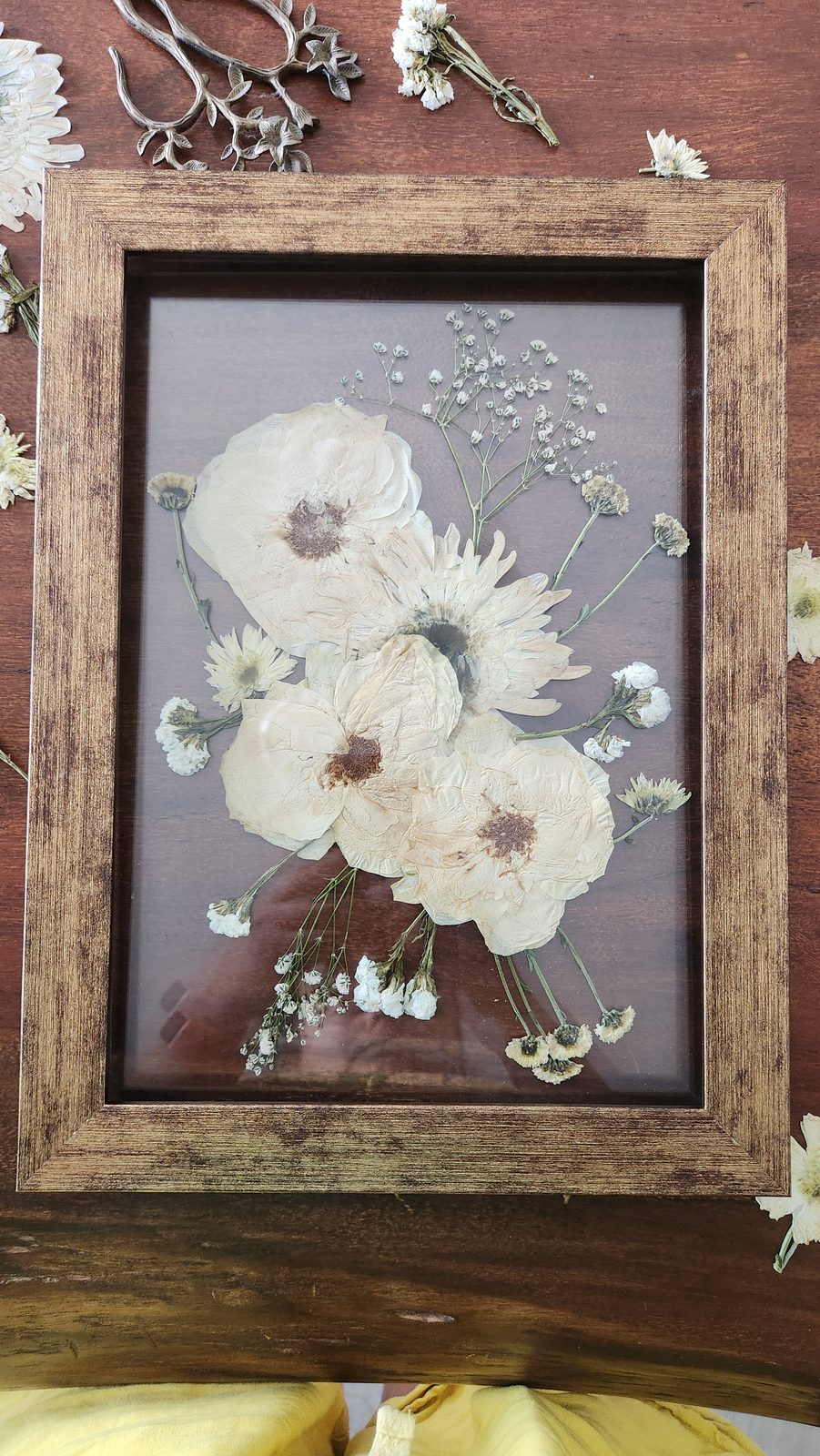 Preserved bouquet in a glass dome