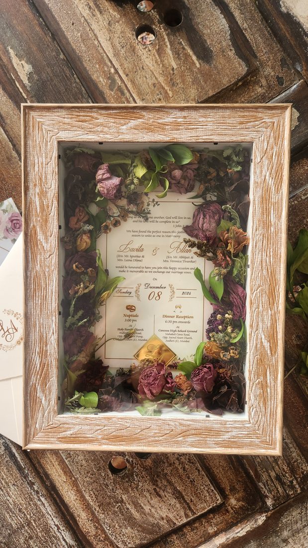 Preserved bridal bouquet in a glass dome